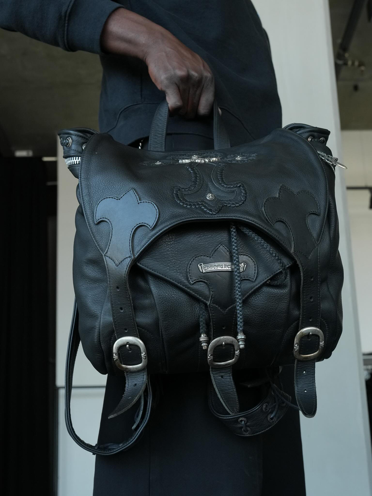 CHROME HEARTS Gunslinger Leather Backpack with Large Silver Filigree Cross Embellishment